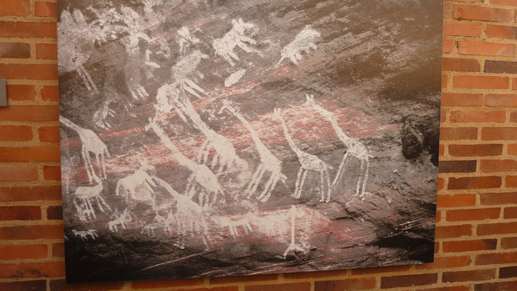 A reproduction of an ancient cave painting.